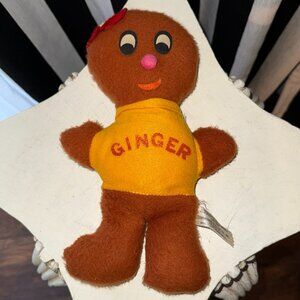 This product is a vintage 1940s 1950s plush gingerbread toy by the brand Commonw